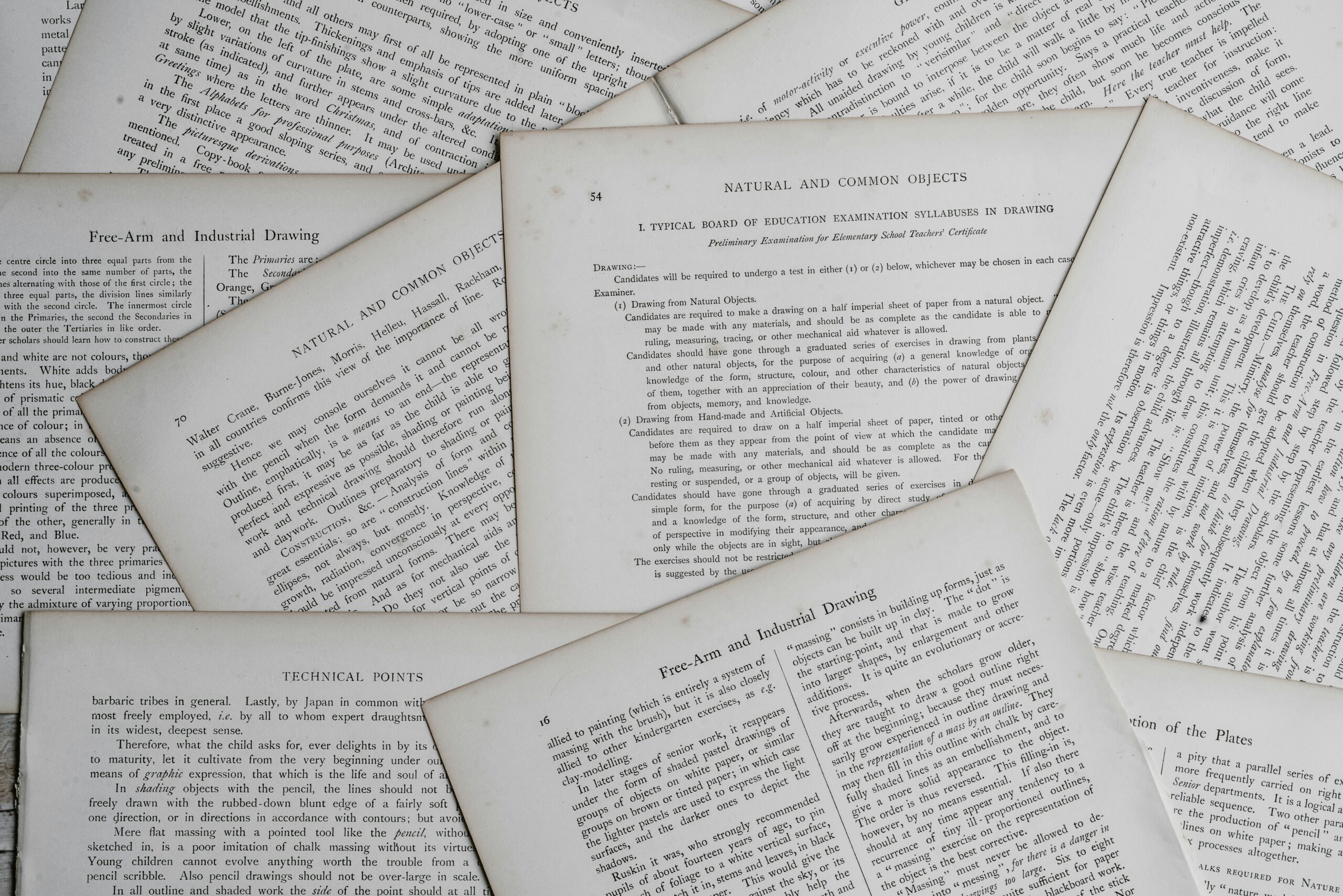 Pages from various old academic papers pictured.