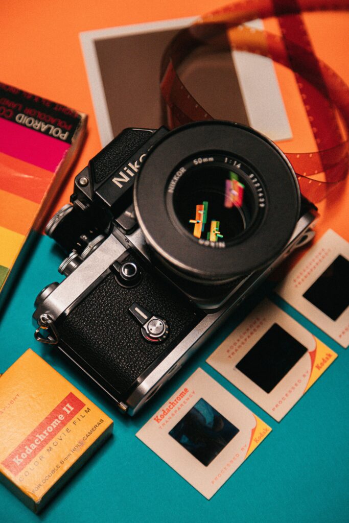 Nikon camera and film prints pictured.